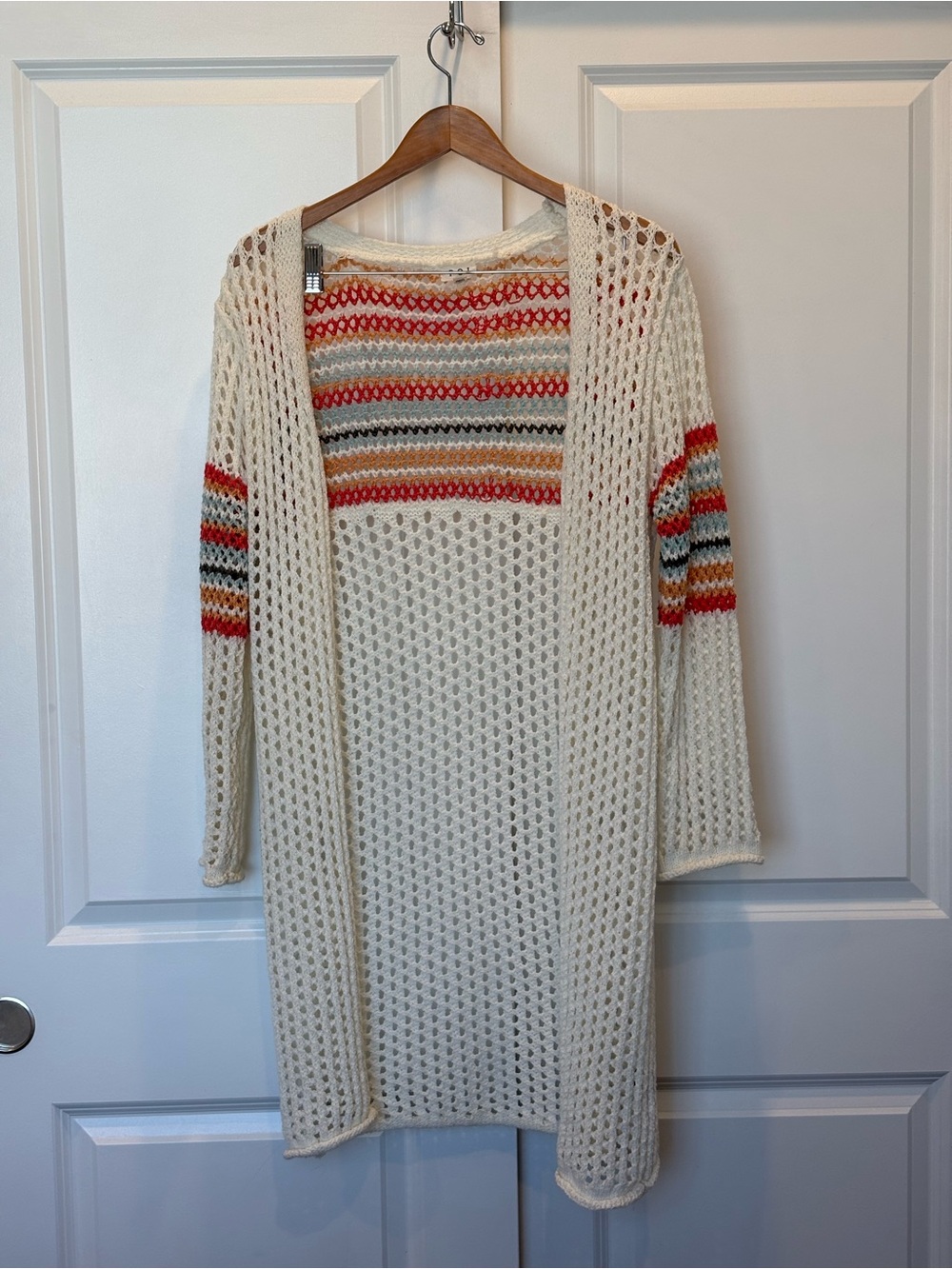 Open-Knit Cream Cardigan with Colorful Stripe Accents